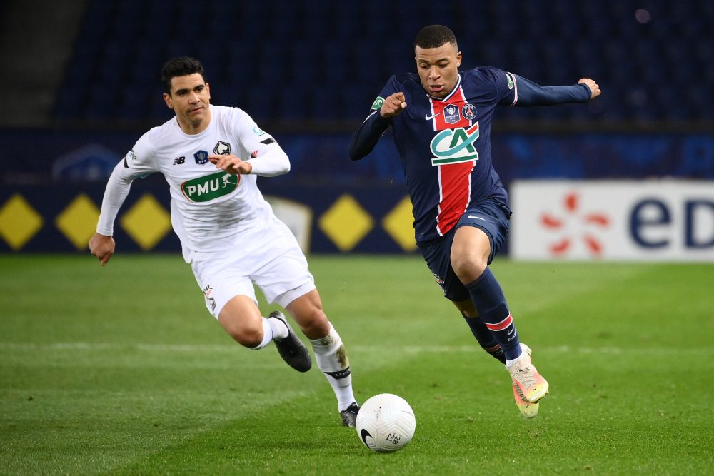 Paris Saint-Germain's French forward Kylian Mbappe (right) in action against Lille at the Parc des Princes in Paris March 17, 2021. u00e2u20acu201d AFP pic