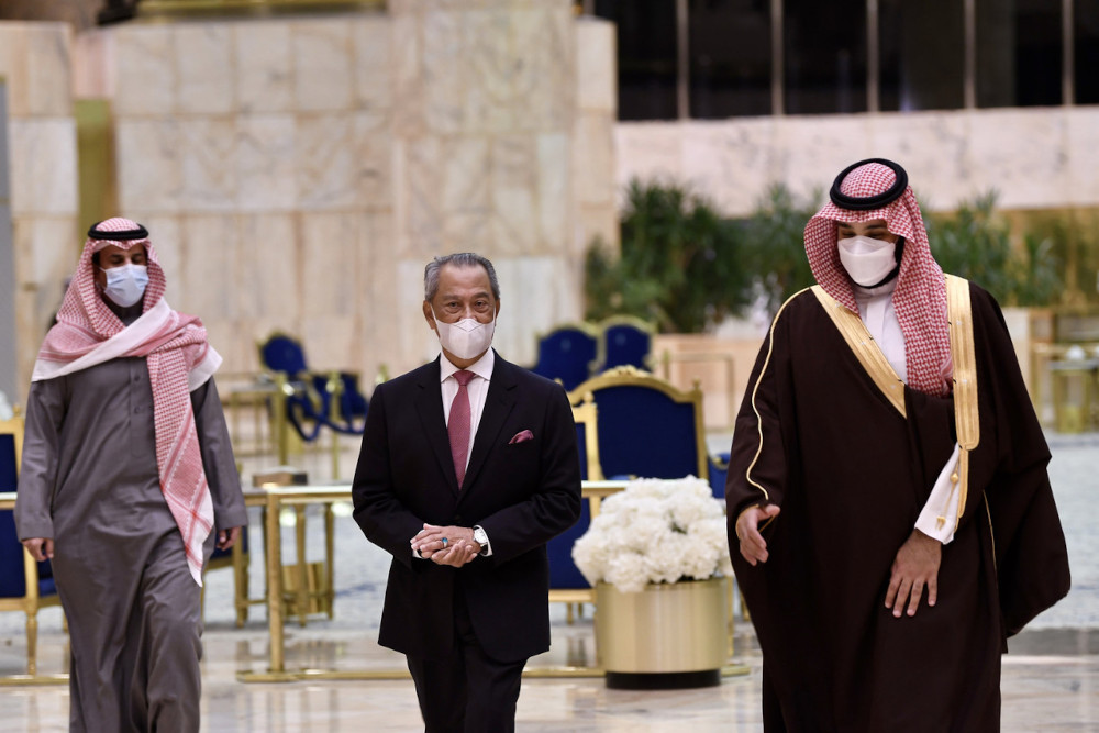 Prime Minister Tan Sri Muhyiddin Yassin with Prince Mohammed Salman Abdulaziz Al-Saud at the King Khalid International Airport in Riyadh, Saudi Arabia, March 9, 2021. u00e2u20acu201d Bernama pic