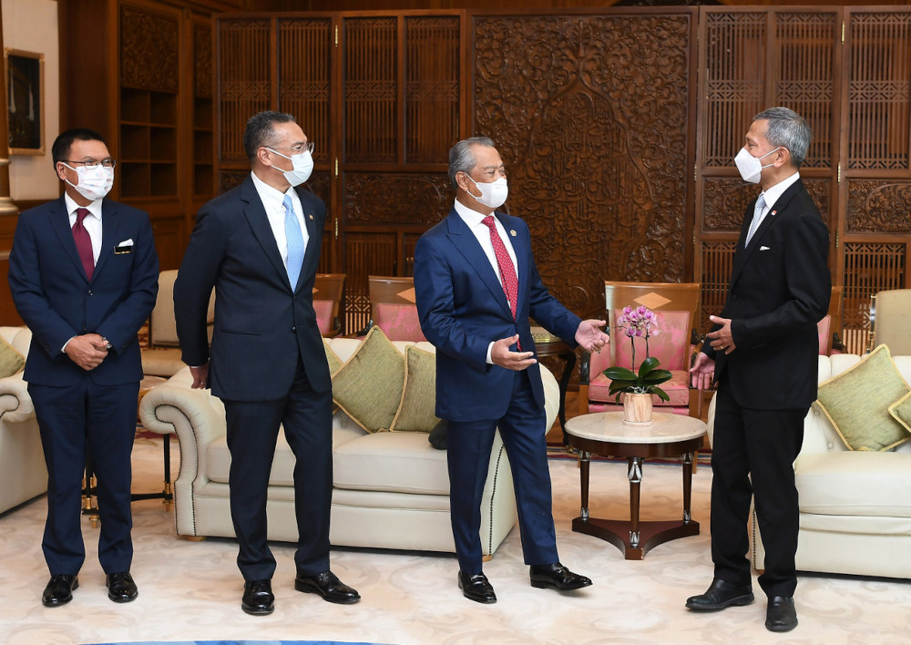 Prime Minister Tan Sri Muhyiddin Yassin with Singapore Foreign Minister Dr Vivian Balakrishnan in Putrajaya, March 23, 2021. u00e2u20acu201d Bernama pic 