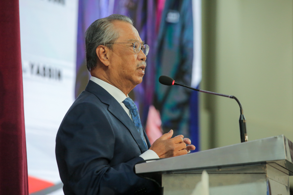 Prime Minister Tan Sri Muhyiddin Yassin delivers his speech during 69th MCDF anniversary celebration in Kajang, March 24, 2021. u00e2u20acu201d Picture by Shafwan Zaidon