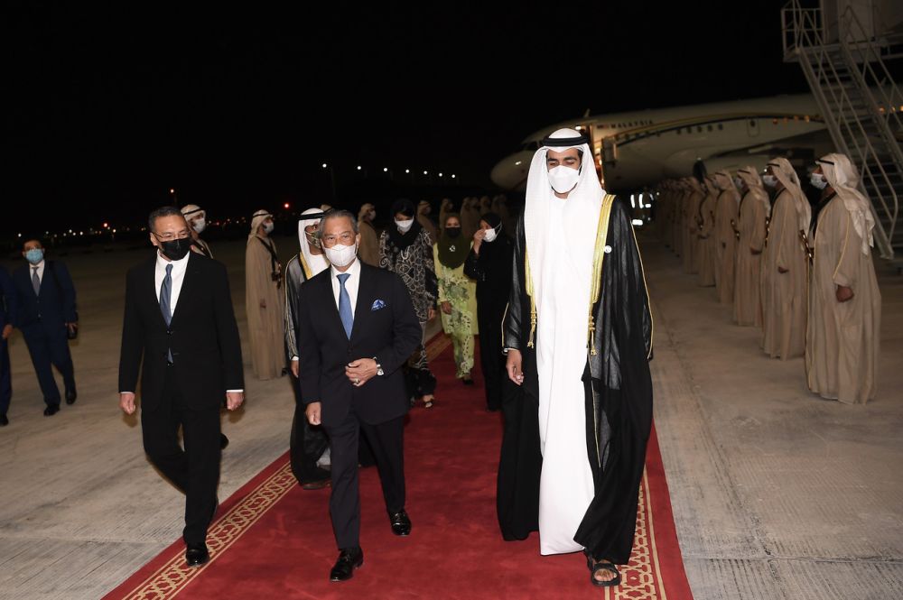 Prime Minister Tan Sri Muhyiddin Yassin is greeted by UAE cabinet minister Sheikh Shakhbout at the Abu Dhabi International Airport March 10, 2021. u00e2u20acu201d Bernama picnn