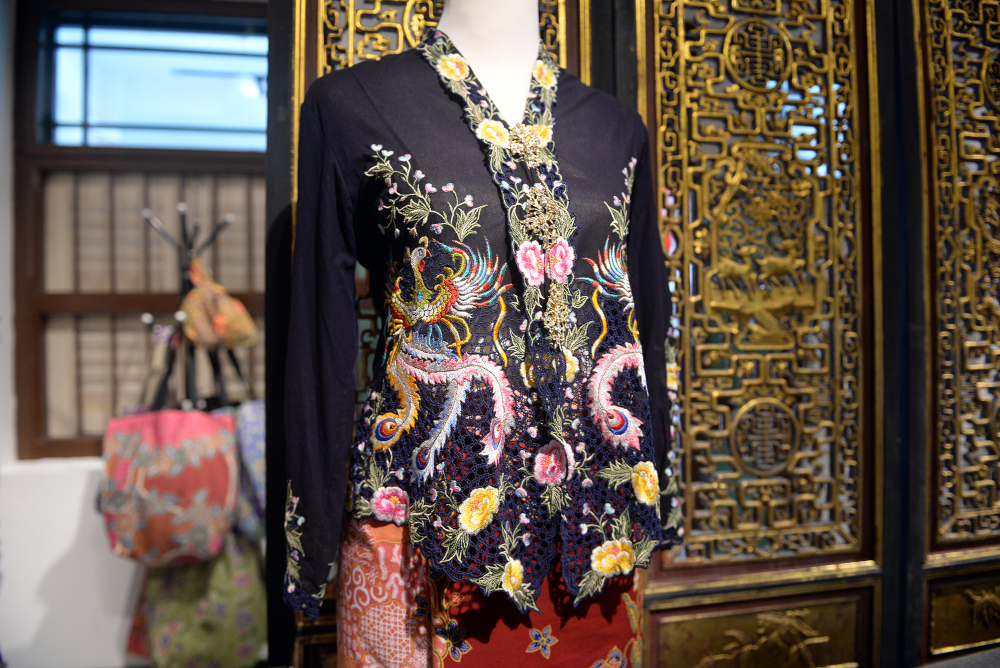Rising phoenixes on a kebaya by Kenny Loh. — Picture by Steven Ooi KE