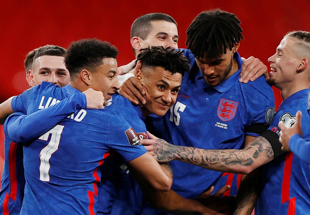 England's Ollie Watkins celebrates with teammates after scoring the fifth goal against San Marino March 26, 2021. u00e2u20acu2022 Pool via Reuters