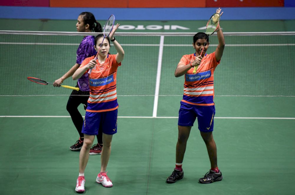 File picture shows Pearly Tan Koong (left) and M Thinaah celebrating their victory in the 2019 Victor Malaysia International Series Womenu00e2u20acu2122s Doubles Final at the Badminton Arena in Ipoh, June 23, 2019. u00e2u20acu201d Bernama pic
