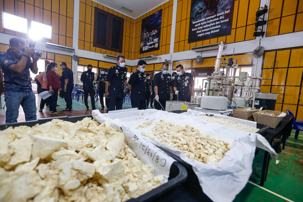 Central Seberang Perai Chief Police ACP Shafee Abd Samad (centre) looking at the seized drugs at the Central Seberang Perai Police Station March 11, 2021. u00e2u20acu201d Picture by Sayuti Zainudin