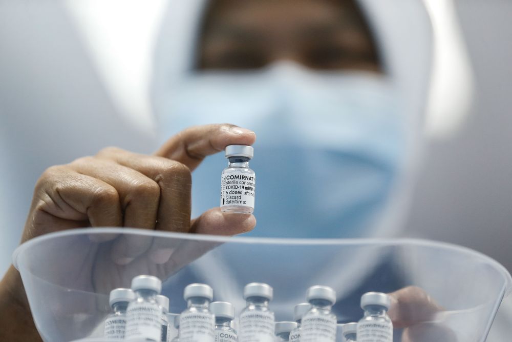 A nurse holds up a dose of the Covid-19 vaccine at the Penang General Hospital in George Town March 2, 2021. u00e2u20acu201d Picture by Sayuti Zainudin