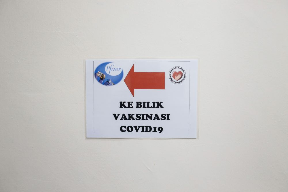 A sign directing recipients to a room where Covid-19 vaccinations are carried out is pictured at the Penang General Hospital  in George Town March 2, 2021. u00e2u20acu201d Picture by Sayuti Zainudin