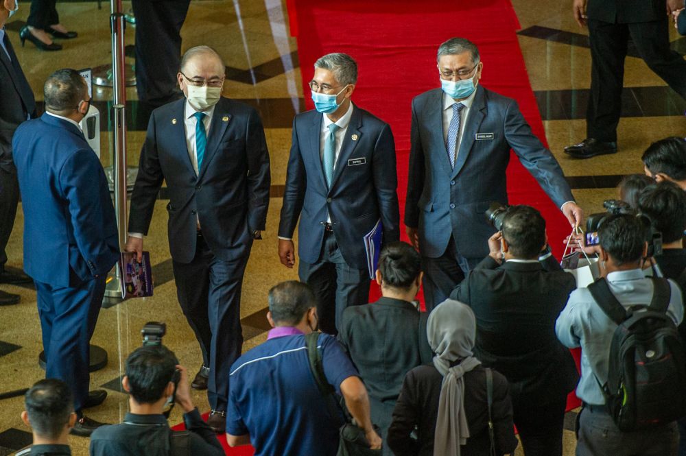 Finance Minister Datuk Seri Tengku Zafrul Abdul Aziz (centre) and Transport Minister Datuk Seri Wee Ka Siong (left) are pictured at a Malaysia Prihatin event at the Putrajaya International Convention Centre March 1, 2020. u00e2u20acu201d Picture by Shafwan Zaidon