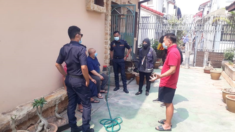 Subang Jaya residents were told by MBSJ officers to remove their plants and clotheslines from their back and front yards. ― Picture courtesy of Subang Jaya residents