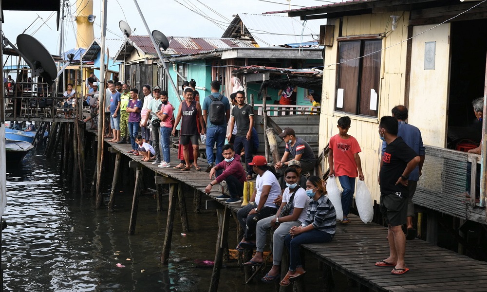 The fire at Kampung Lok Urai on Gaya Island has left hundreds homeless, March 12, 2021. u00e2u20acu2022 Bernama pic