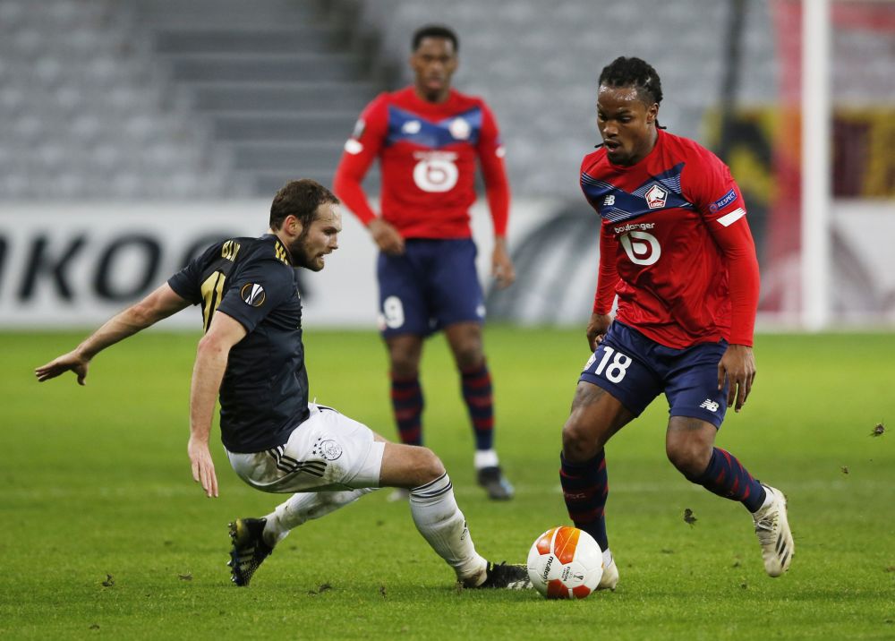 Lille's Renato Sanches in action with Ajax's Daley Blind at the Stade Pierre-Mauroy, Lille February 18, 2021. u00e2u20acu201d Reuters pic