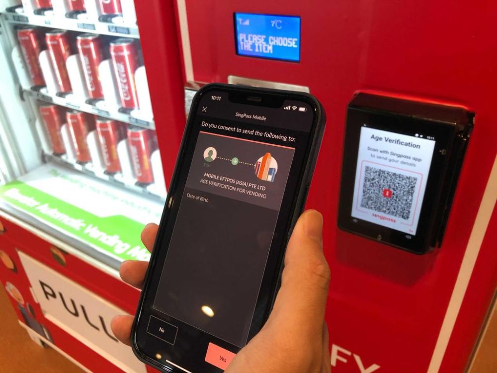 The payment terminal on the vending machine will prompt users to scan a QR code using the SingPass app to verify their age before alcoholic drinks can be dispensed. u00e2u20acu201d TODAY pic