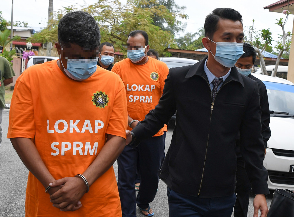 The company directors, aged 49 and 51, were arrested in Selangor while the 59-year-old civil servant was nabbed at his office in Terengganu. u00e2u20acu201d Bernama pic 