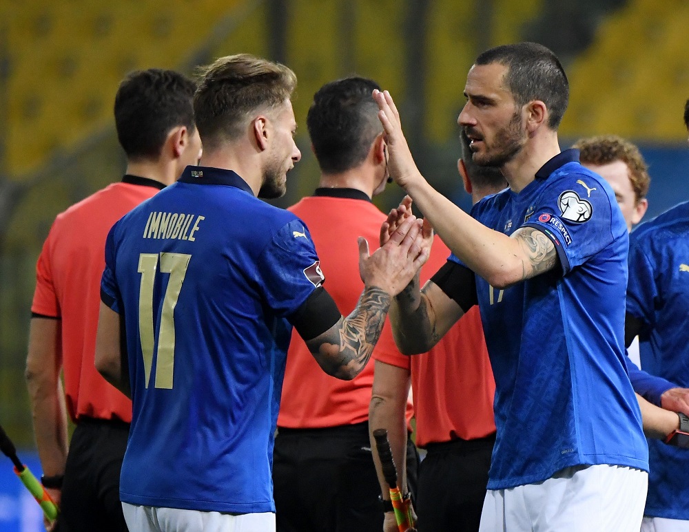 Italy's Leonardo Bonucci celebrates with Ciro Immobile after the match against Northern Ireland March 26, 2021. u00e2u20acu2022 Reuters pic