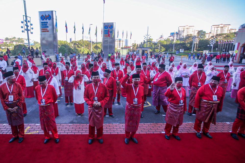 Umno president Datuk Seri Ahmad Zahid Hamidi waves at reporters at the World Trade Centre Kuala Lumpur March 28, 2021. u00e2u20acu201d Picture by Hari Anggara