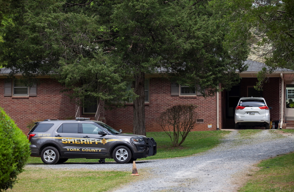 Members of the York County Sheriff's Office speak outside the home of Phillip Adams, a former professional football player who fatally shot a prominent five people before taking his own life, in Rock Hill, South Carolina April 8, 2021. u00e2u20acu201d Reuters pic