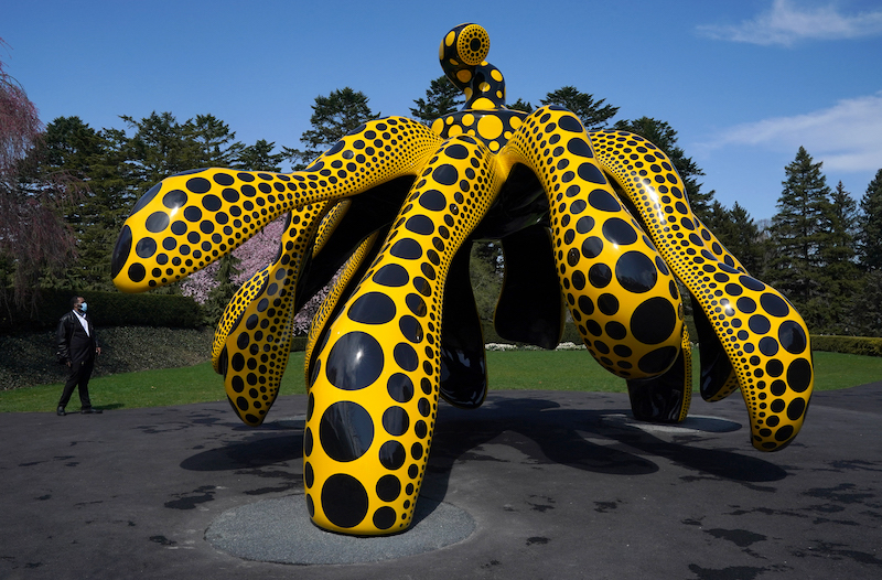 Japanese artist Yayoi Kusamau00e2u20acu2122s u00e2u20acu02dcDancing Pumpkinu00e2u20acu2122 a 4.8-metre sculpture is on display during the KUSAMA: Cosmic Nature Media Preview April 7, 2021 at the New York Botanical Garden in the Bronx borough of New York City. u00e2u20acu201d AFP pic