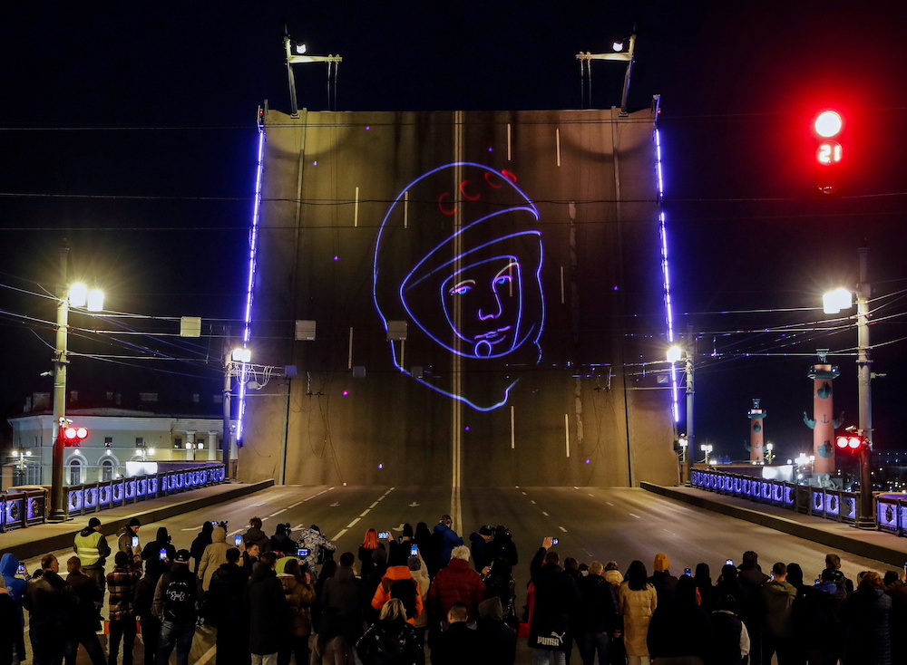 Spectators watch a projection of Yuri Gagarin's portrait to mark the 60th anniversary of the first human space flight in Saint Petersburg, Russia April 12, 2021. u00e2u20acu201d Reuters pic