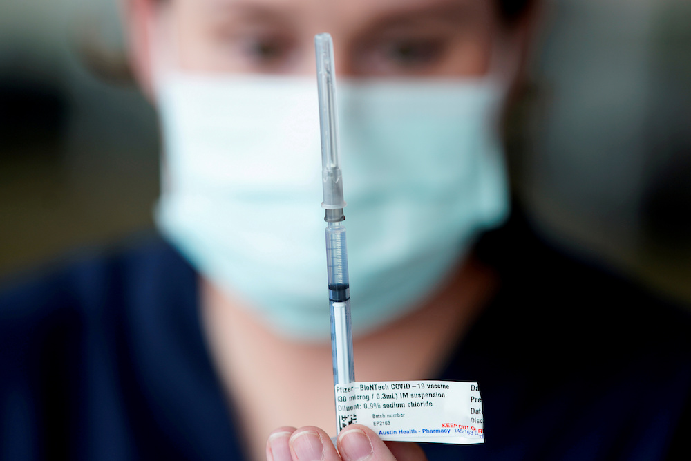 A healthcare professional prepares a dose of the Pfizer coronavirus disease (Covid-19) vaccine as high-risk workers receive the first vaccines in the state of Victoria's rollout of the programme, in Melbourne, Australia February 22, 2021. u00e2u20acu201d Reuters pic
