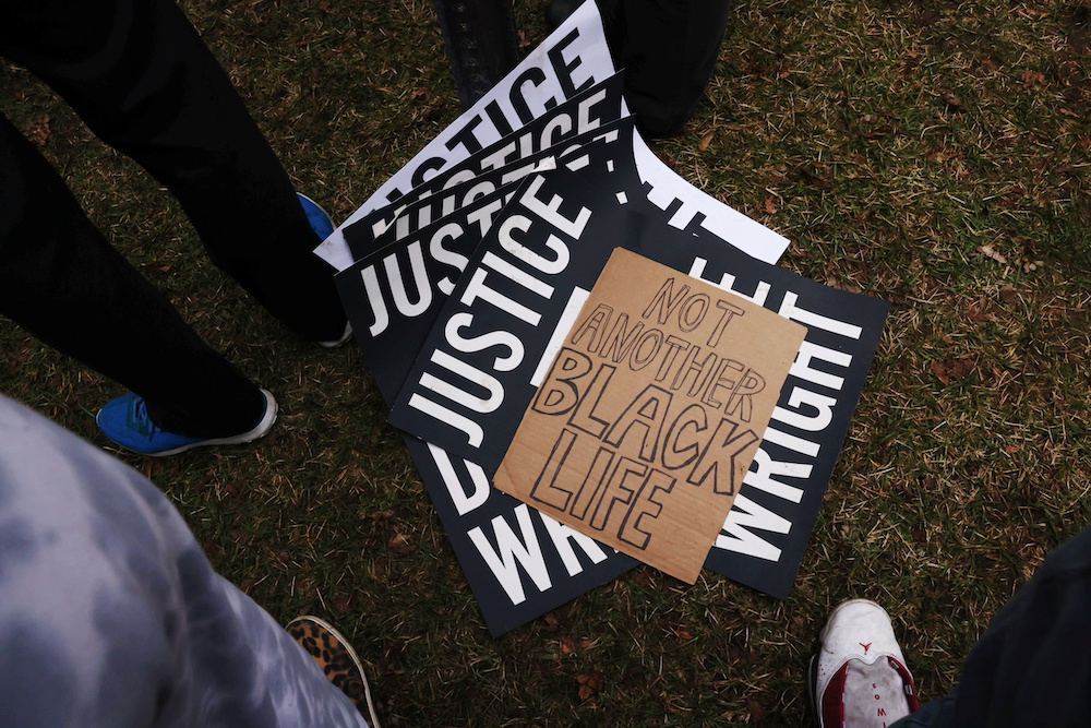 Signs are seen on the ground as protesters rally outside Brooklyn Center Police Department a day after Daunte Wright was shot and killed by a police officer, in Brooklyn Center, Minnesota, US April 12, 2021. u00e2u20acu201d Reuters pic