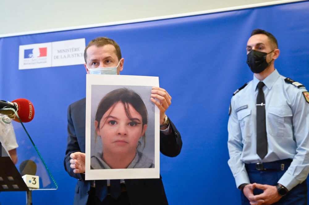 French public prosecutor Nicolas Heitz holds a portrait of missing child Mia Montemaggi during a press conference at The Epinal Courthouse in Epinal, eastern France on April 14, 2021. u00e2u20acu201d AFP pic