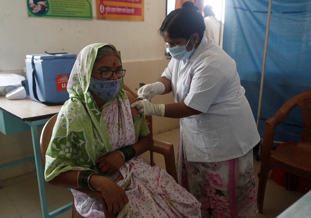 A woman receives a dose of Covishield coronavirus disease vaccine manufactured by Serum Institute of India, at a primary healthcare centre in Limb village in Satara district in the western state of Maharashtra March 24, 2021. u00e2u20acu201d Reuters pic