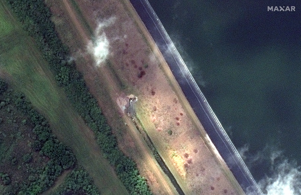A view shows a breach in retaining ponds at the Piney Point wastewater reservoir near Tampa Bay, Florida in this Maxar Technologies satellite image taken April 5, 2021. u00e2u20acu201d Picture courtesy of Maxar Technologies/Handout via Reuters
