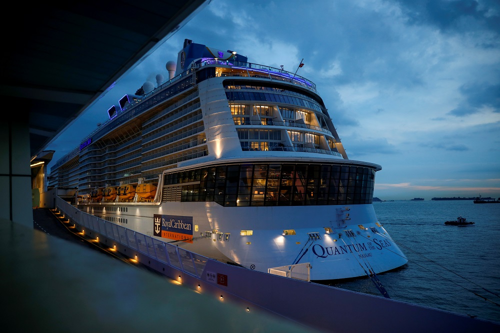 Royal Caribbeanu00e2u20acu2122s Quantum of the Seas cruise ship is moored at Marina Bay Cruise Centre after a passenger tested positive for coronavirus disease during a cruise to nowhere, in Singapore December 9, 2020. u00e2u20acu201d Reuters pic