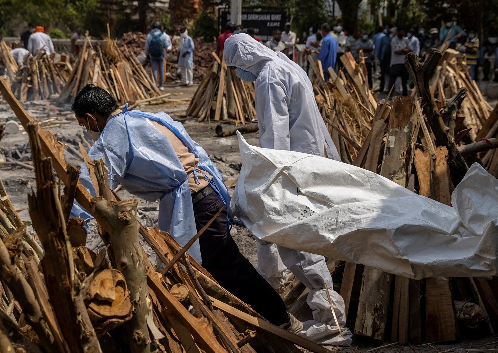 Relatives carry the body of a person, who died due to the coronavirus disease, for cremation at a crematorium ground in New Delhi April 28, 2021. u00e2u20acu201d Reuters pic