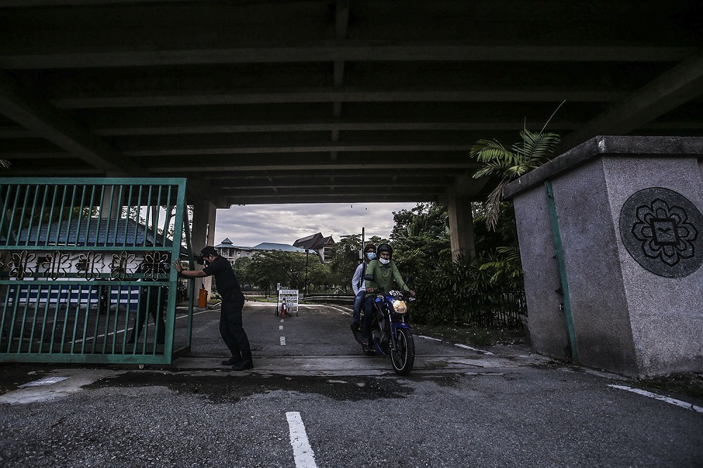 International Islamic University Malaysia students are seen leaving the campus in Gombak April 1, 2021. u00e2u20acu201d Picture by Hari Anggara