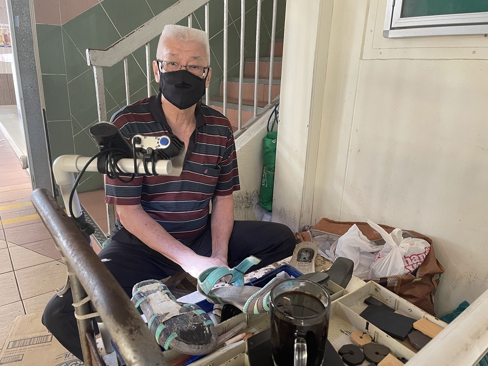 Yeong Miow Hor who mends shoes is now earning about half of what he used to pre-pandemic. — TODAY pic