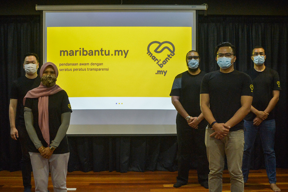 Muda members are seen during the launch of maribantu.my in Petaling Jaya on April 9, 2021. u00e2u20acu201d Picture by Miera Zulyana