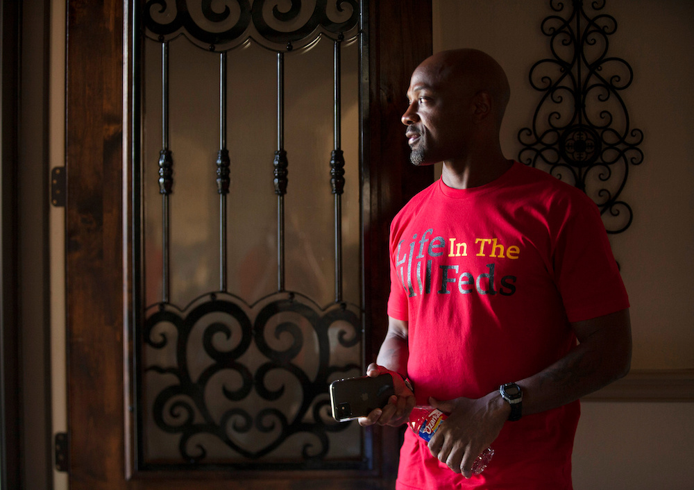 Wearing a T-shirt he designed himself, Kendrick Fulton, who was released to home confinement due to the coronavirus disease (Covid-19) pandemic, poses for a photo in Round Rock, Texa, April 8, 2021. u00e2u20acu201d Reuters pic