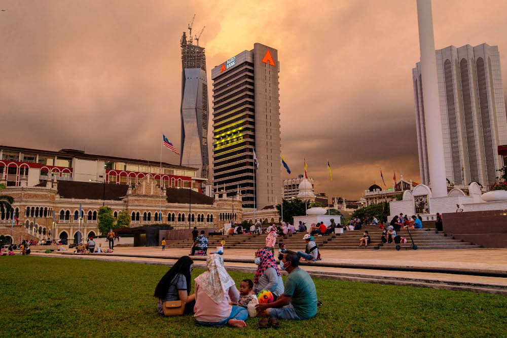People break their fast during the holy month of Ramadan at Dataran Merdeka in Kuala Lumpur April 18, 2021. u00e2u20acu201d Picture by Firdaus Latif