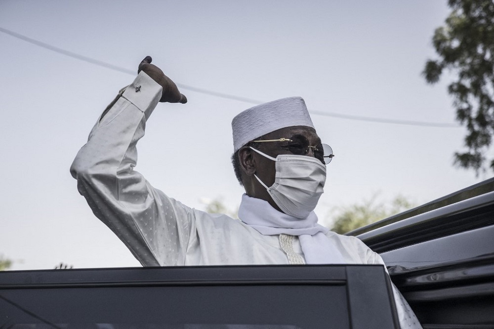 Chadian President Idriss Deby Itno greets supporters as he leaves after casting his ballot at a polling station in Nu00e2u20acu2122djamena April 11, 2021. u00e2u20acu201d AFP pic