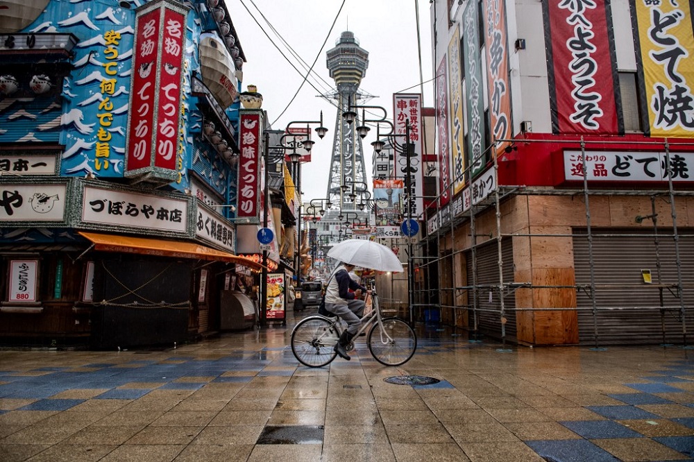 Tsutenkaku tower is seen from Shinsekai shopping street in Osaka April 17, 2021, as record numbers of new Covid-19 infections were reported in the city in recent days. u00e2u20acu201d AFP pic