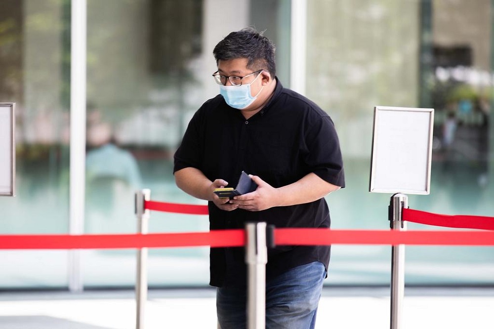 De Beers Wong Tian Jun was jailed and given a fine of S$20,000 after pleading guilty to 10 charges of cheating, criminal intimidation and making an obscene film. u00e2u20acu201d TODAY pic