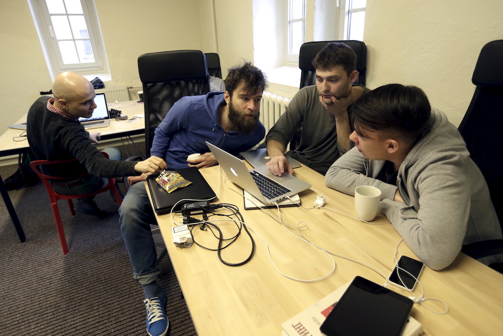 Journalists work in the independent, Russia-focused, media start-up Meduza office in Riga March 30, 2015. u00e2u20acu201d Reuters pic 