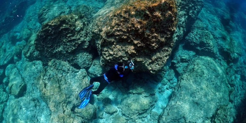 Cypriot marine ecologist Louis Hadjioannou, 38, dives to photograph the coral, as he monitors the impact of climate change on the delicate fauna in the crystal clear waters of Glyko Nero in Ayia Napa. u00e2u20acu201d AFP pic