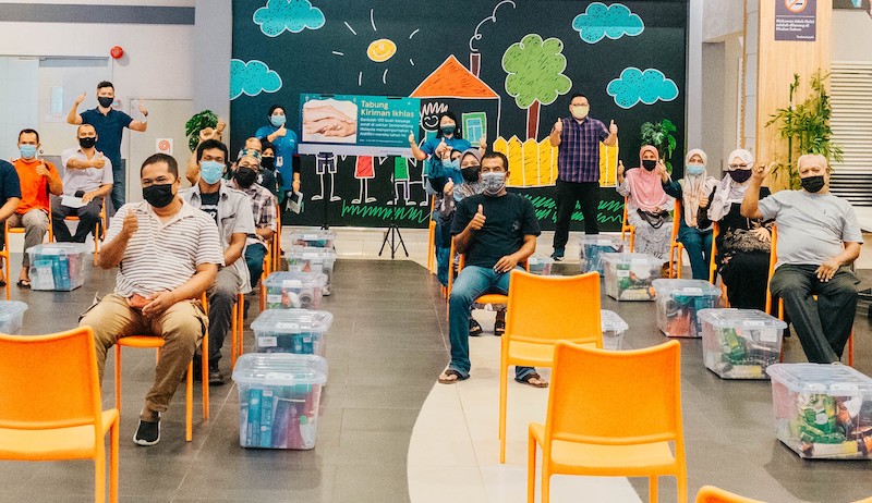 The first distribution of Kiriman Ikhlas Raya cash vouchers and Tabung Kiriman Ikhlas goods took place in Lotus’s Kota Baru, Kelantan on April 20. — Picture courtesy of Lotus Stores Malaysia