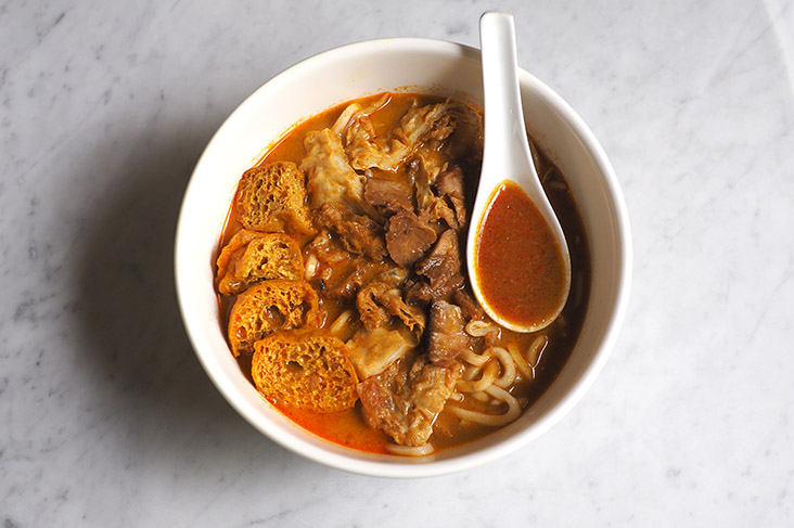 f you prefer something a little different, pair the noodles with a mild curry broth served with beancurd puffs, 'foo chuk' and sliced 'char siu'