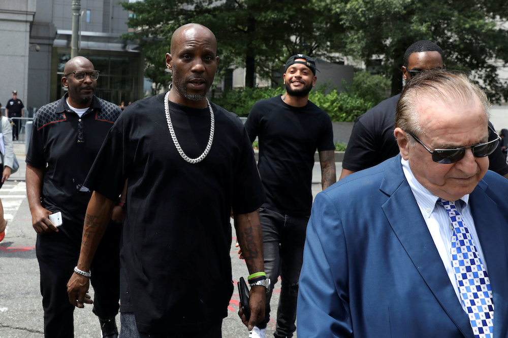 Earl Simmons (centre), also known as the rapper DMX, exits the US Federal Court in Manhattan following a hearing regarding income tax evasion charges in New York City, US, July 17, 2017. u00e2u20acu201d Reuters picnn