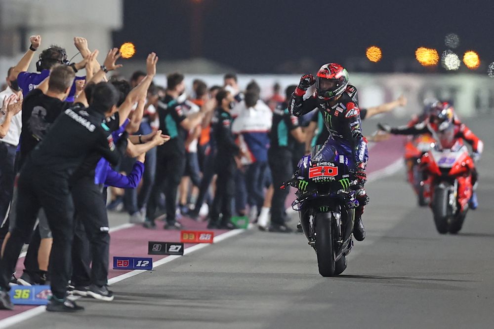 Monster Energy Yamaha MotoGP's French rider Fabio Quartararo celebrates after winning the Moto GP Grand Prix of Doha at the Losail International Circuit, in the city of Lusail on April 4, 2021. u00e2u20acu201d AFP pic