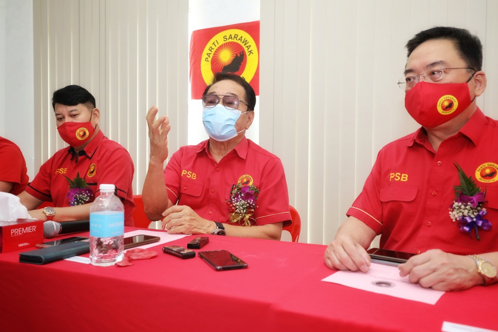 Datuk Seri Wong Soon Koh (centre) flanked by George Lo (right) and Johnical Rayong at the press conference April 11, 2021. u00e2u20acu201d Picture by Chimon Upon/Borneo Post
