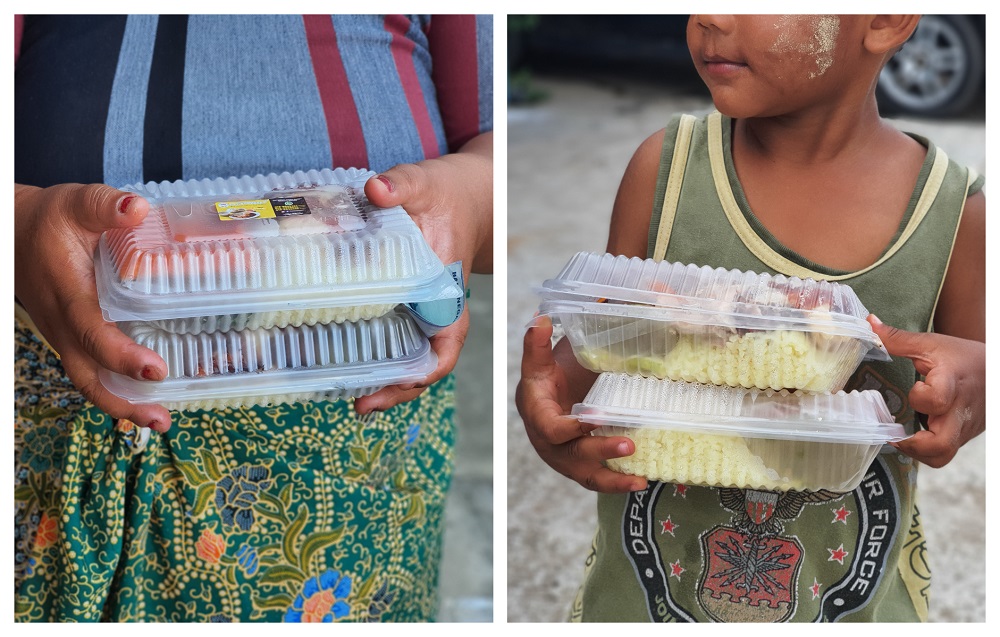 Some of Beserahu00e2u20acu2122s poor and homeless people receiving chicken rice packets through last yearu00e2u20acu2122s initiative. u00e2u20acu201d Picture by Aiman Azahari