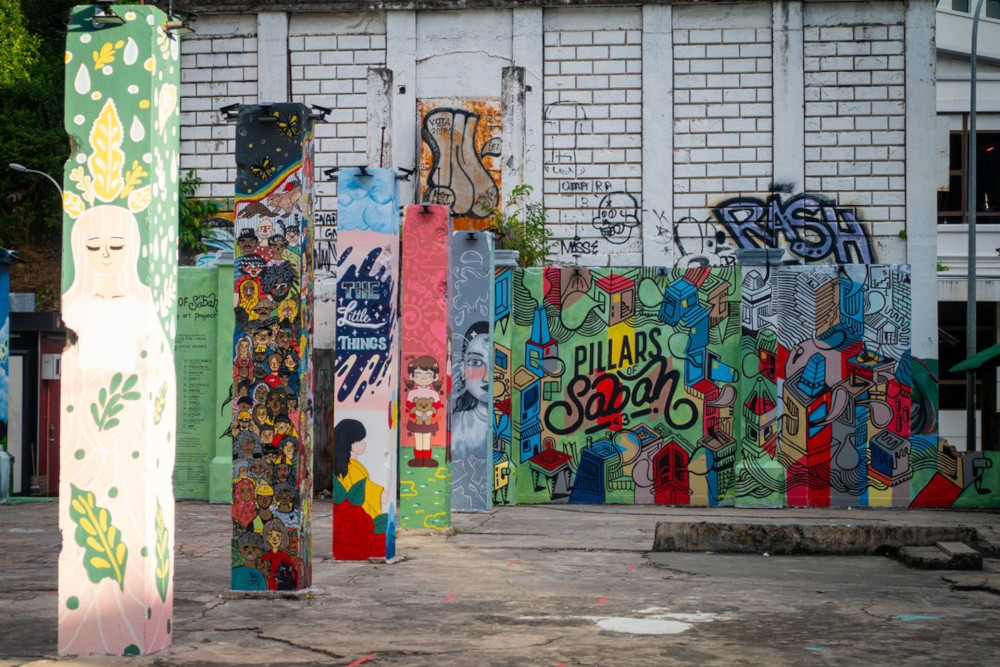 The Pillars of Sabah before the artworks were wiped off with white paint. u00e2u20acu201d Borneo Post Online picnn