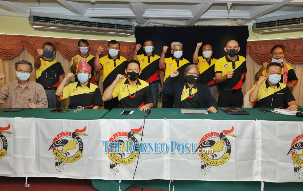 (Front from third left) Peter and Kenneth with party members after the launch of the PDU team. u00e2u20acu201d Borneo Post Online pic