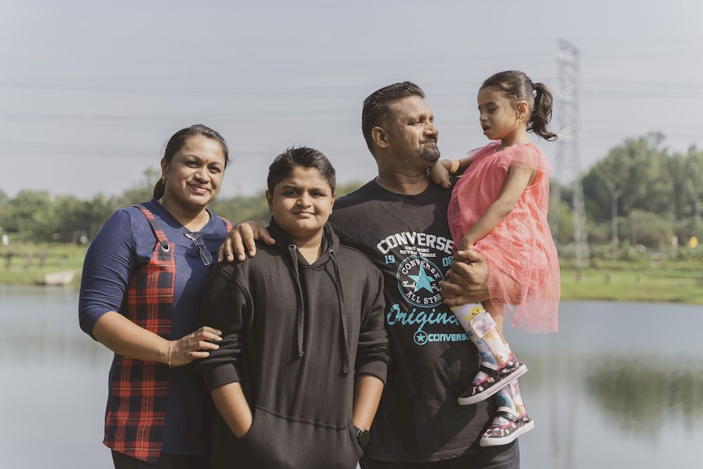 Swathi pictured with her parents and older brother Harrish. — Picture courtesy of Sivasangaran Kumaran