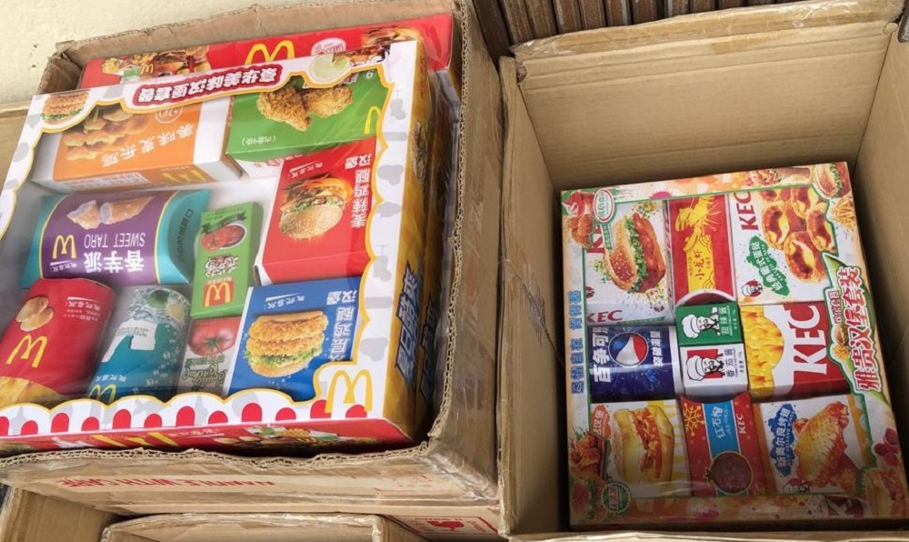 Boxes of KFC food paper offerings are among the prayer items sold in Perniagaan Barangan Sembahyang Cina Hua Seng. ― Picture via Hor Sau Wan