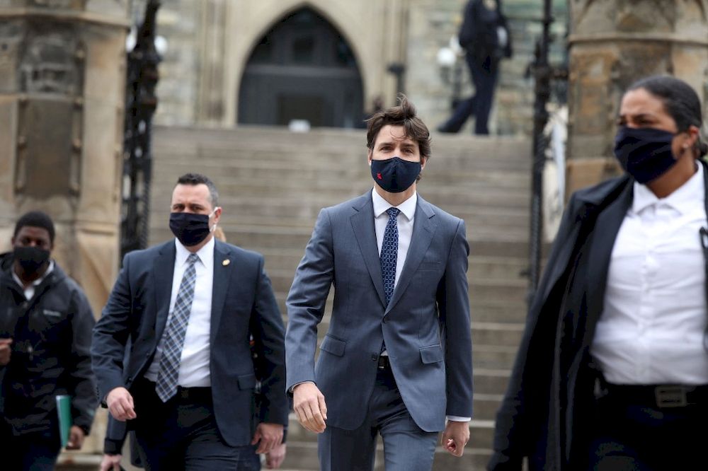 Canadian Prime Minister Justin Trudeau crosses Wellington street to attend a news conference April 16, 2021 in Ottawa, Canada. u00e2u20acu201d AFP pic